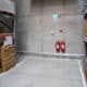 fire extinguishers on wall in warehouse