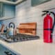 small fire extinguisher on kitchen countertop