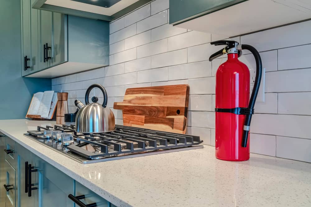 small fire extinguisher on kitchen countertop